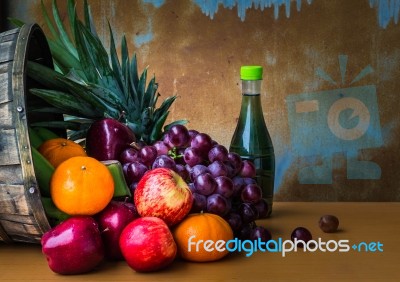 Fresh Fruits On Wooden Stock Photo