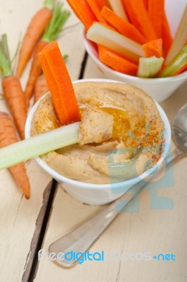 Fresh Hummus Dip With Raw Carrot And Celery Stock Photo