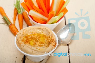 Fresh Hummus Dip With Raw Carrot And Celery Stock Photo