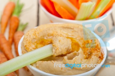 Fresh Hummus Dip With Raw Carrot And Celery Stock Photo