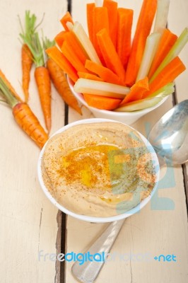 Fresh Hummus Dip With Raw Carrot And Celery Stock Photo