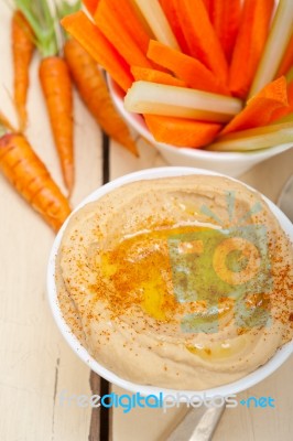 Fresh Hummus Dip With Raw Carrot And Celery Stock Photo