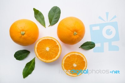 Fresh Orange Citrus Fruit On White Background. Top View Stock Photo