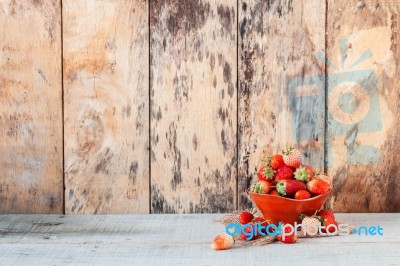 Fresh Strawberries On Wooden Stock Photo