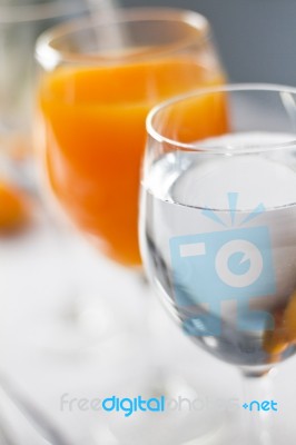 Freshly Made Orange Juice And Water Stock Photo