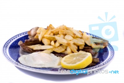 Fried Potatoes With Egg And Meat Stock Photo