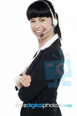 Friendly Female Telephone Operator At Your Service Stock Photo