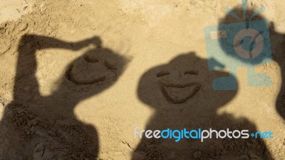 Friends Having Fun On The Beach In Malta Stock Photo