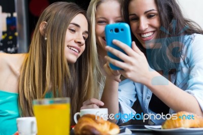 Friends Having Fun With Smartphones Stock Photo