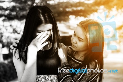 Friends Hugging And Giving Consolation  Stock Photo