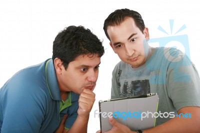 Friends Looking At Tablet Pc Stock Photo
