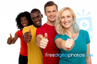 Friends showing Thumbs Up Stock Photo