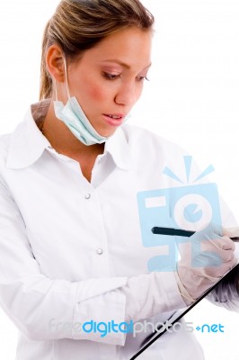 Front View Of Doctor Writing Prescription Stock Photo