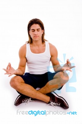 Front View Of Male Doing Yoga Stock Photo