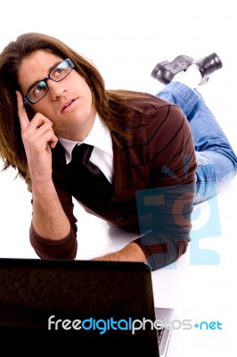 Front View Of Thinking Man Looking Up Stock Photo