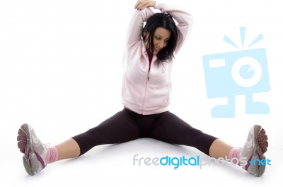 Front View Of Woman Doing Exercise On White Background Stock Photo