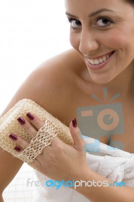 Front View Of Woman Scrubbing Her Body Stock Photo