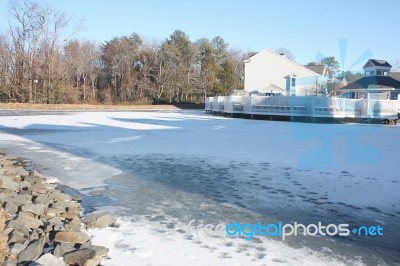 Frozen River During Winter Stock Photo