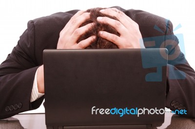 Frustrated Business Man With Laptop Stock Photo