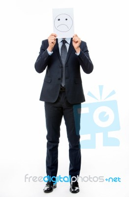 Full Length Portraif Of A Businessman Holding White Card With Em… Stock Photo
