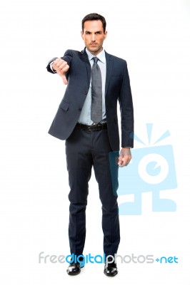 Full Length Portrait Of A Businessman Looking Angry Stock Photo