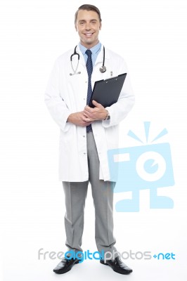 Full Length Portrait Of Doctor At Duty Stock Photo
