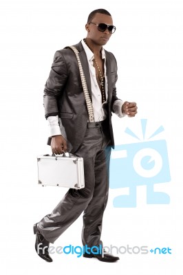 Gangster Walking With His Briefcase Stock Photo