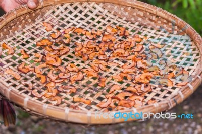 Garcinia Atroviridis Drying In A Bamboo Basket Stock Photo