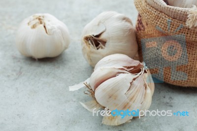 Garlic On The Floor Stock Photo