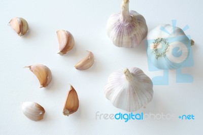 Garlics On White Background Stock Photo