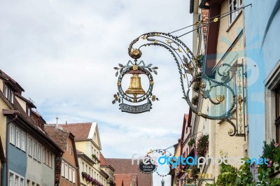 Gasthof Hanging Sign In Rothenburg Stock Photo