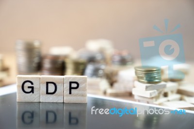 Gdp  Word Written In Wooden Cube Reflection On Black Mirrow With… Stock Photo