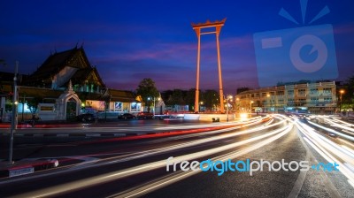 Giant Swing And Wat Suthat At Dusk In Bangkok Stock Photo