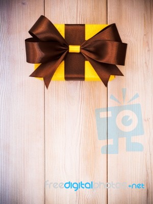 Gift Box On The Wooden Board Stock Photo