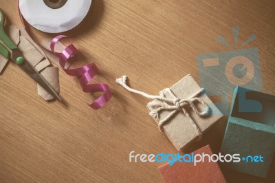 Gift Wrapping On A Wooden Stock Photo