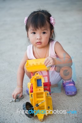 Girl Baby Playing Toy Stock Photo