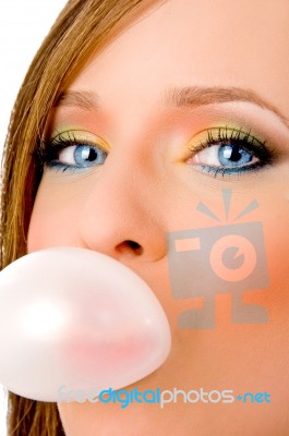 Girl Blowing Chewing Gum Stock Photo