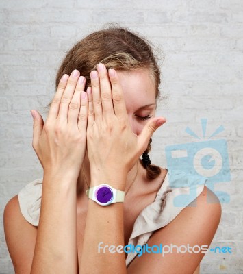 Girl Cover Her Face With Hands Stock Photo
