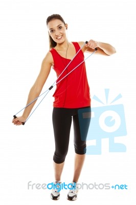 Girl Exercising With Elastic Fitness Band Stock Photo