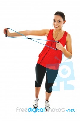 Girl Exercising With Elastic Fitness Band Stock Photo