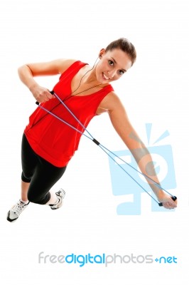 Girl Exercising With Elastic Fitness Band Stock Photo