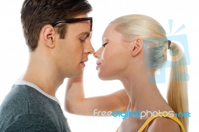 Girl Going To Kiss Her Lover Stock Photo