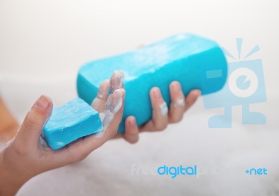 Girl Holding Soap And Sponge Stock Photo