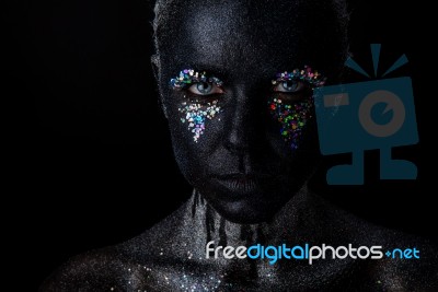 Girl In Black Makeup With Sparkles Stock Photo