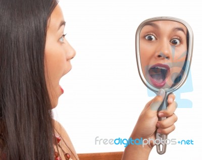 Girl Looking In The Mirror Stock Photo