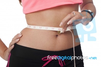 Girl Measures The Waist With Meter Stock Photo