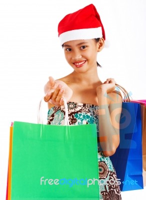 Girl On Christmas Shopping Spree Stock Photo