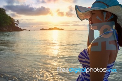 Girl On The Beach At Sunrise Stock Photo Girl On The Beach At Sunrise Stock Photo