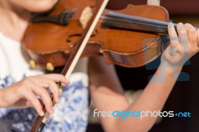 Girl Plays Violin Stock Photo