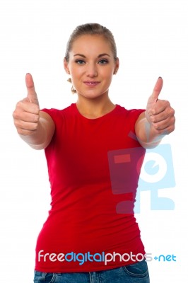 Girl Showing Double Thumbs Up Stock Photo